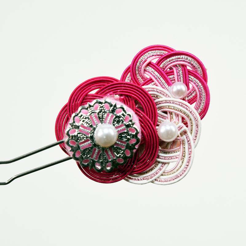 水引で作った簪：ピンク色の梅［簡易包装］（折形礼法、水引カルチャー倶楽部）の裏面